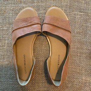 Lucky Brand Fentin open toe flat slides.